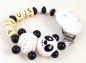 Preview: Schnullerkette mit Namen "Panda&Häkelkörper" in schwarz/weiß