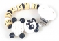 Preview: Schnullerkette mit Namen "Panda&Häkelkörper" in schwarz/weiß