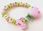 Preview: Schnullerkette mit Name "Dino" in babyrosa/lemon