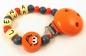 Preview: Schnullerkette mit Name "Smiley" in orange/grau