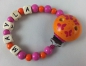 Preview: Schnullerkette mit Name in orange/pink und Schmetterlingsclip in orange