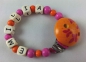 Preview: Schnullerkette mit Name in orange/pink und Schmetterlingsclip in orange