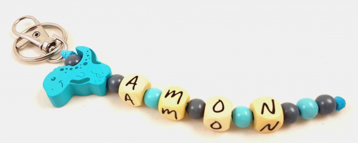 Schlüsselanhänger mit Name "Dino" in grau/mint