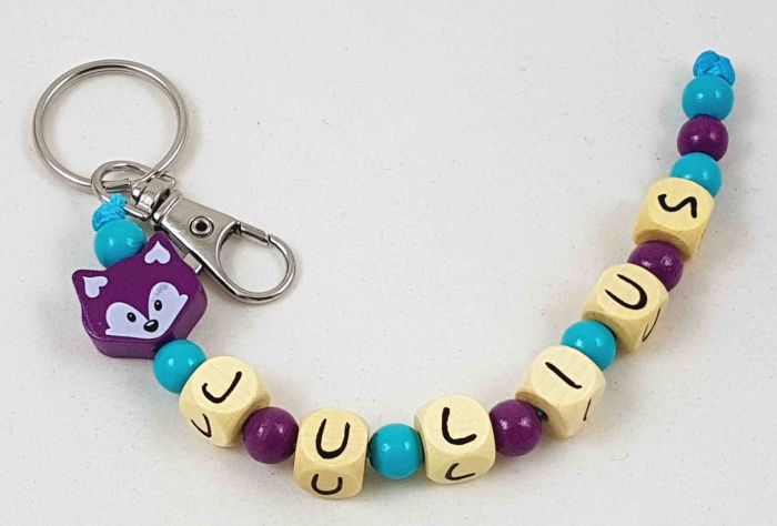 Schlüsselanhänger mit Name "Fuchs" in mint/pflaume