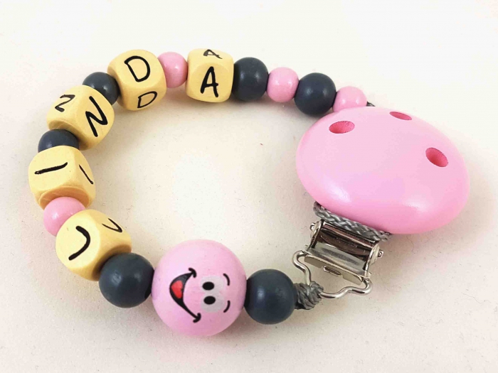 Schnullerkette mit Name "3D Smiley" in babyrosa/grau