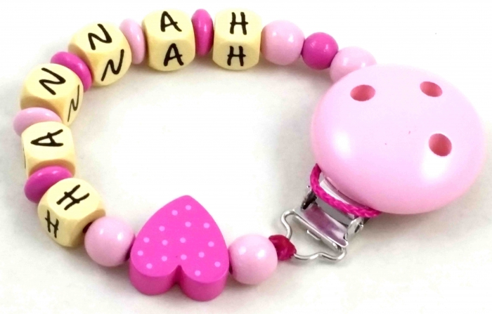 Schnullerkette mit Name "Tupfenherz" in babyrosa/pink